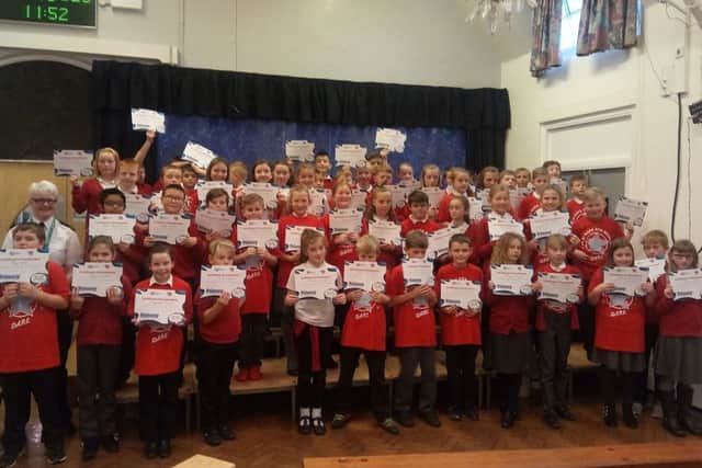 Year 6 pupils at Croft Primary School, Sutton, at their DARE graduation.