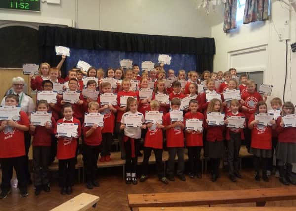 Year 6 pupils at Croft Primary School, Sutton, at their DARE graduation.