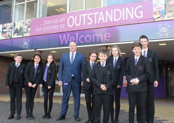 Principal Tim Croft with some of the pupils at Sutton Community Academy.