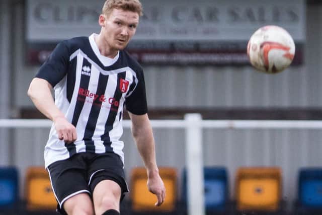 Joe Austin tries to find a Clipstone player versus Thackley FC
