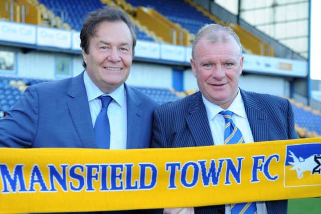 Chairman John Radford and manager Steve Evans