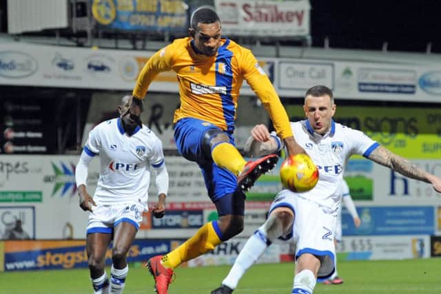 Mansfield Town v Oldham Athletic.
Krystian Pearce brings the ball under his control a first half attack.