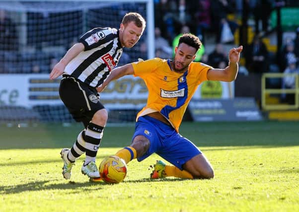 Mansfield Town's Rhys Bennett in action at Meadow Lane. Photo by Chris Holloway