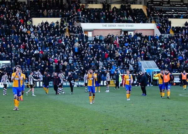 Mansfield Town's fans applaud the travelling fans - Pic by Chris Holloway