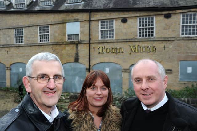Heritage consultant, Denis Hill, left, Mansfield BID manager, Sarah Nelson and Jeremy Scorer managing partner at the Charnwood Training Group, pictured at the old Town Mill, Bridge Street, Mansfield, which is to be converted in to a pub food training academy.