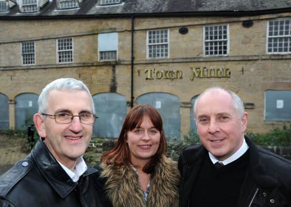 Heritage consultant, Denis Hill, left, Mansfield BID manager, Sarah Nelson and Jeremy Scorer managing partner at the Charnwood Training Group, pictured at the old Town Mill, Bridge Street, Mansfield, which is to be converted in to a pub food training academy.