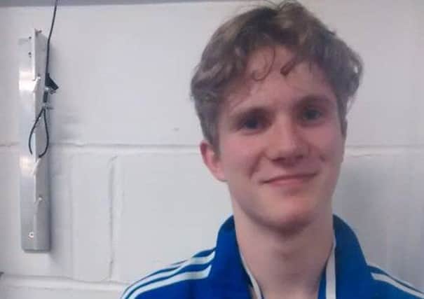 A bronze medal for teenage fencer Patrick Carey.