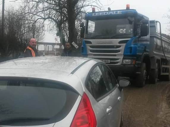 A car blocks Leedale lorries in Huthwaite as one woman starts a lone protest.