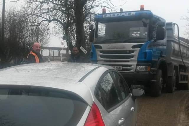 A car blocks Leedale lorries in Huthwaite as one woman starts a lone protest.