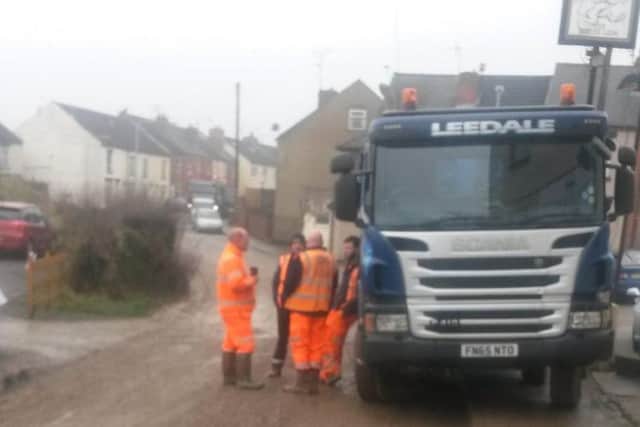 Leedale drivers park up on the road after a protester blocked their path onto Brierley Forest Golf Course