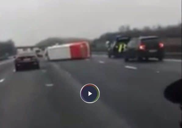 Overturned vehicle on M1