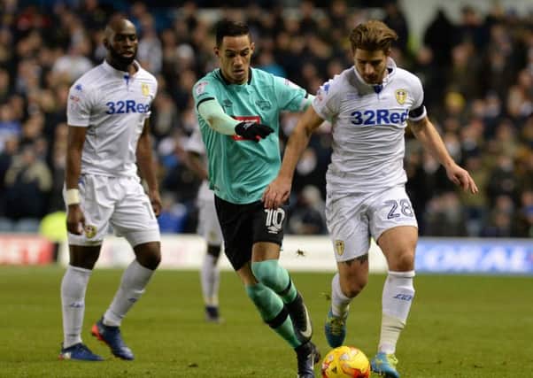 Gaetanao Berardi holds off Tom Ince.
Leeds United v Derby County.  SkyBet Championship. 13 January 2017.  Picture Bruce Rollinson