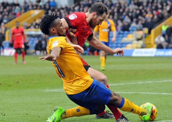 Mansfield Town v Leyton Orient.
Shaquile Coulthirst keeps the ball alive in the first half.