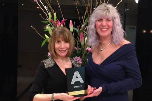 APTCOO boss Carol Burkitt (right) and education and training lead Sandra Currey with the award.