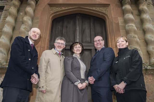 On the abbey steps, (from left) Couns John Knight and Alan Rhodes with staff members, Victorian housekeeper and storyteller Nicky Rafferty and catering manager Isabel Garratt, and Parkwood Leisure chief, Glen Hall.