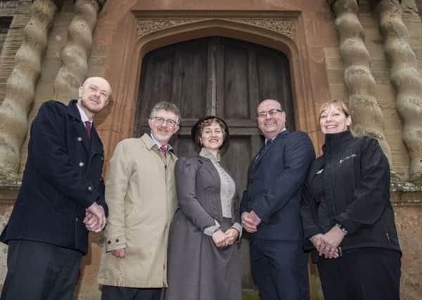 On the abbey steps, (from left) Couns John Knight and Alan Rhodes with staff members, Victorian housekeeper and storyteller Nicky Rafferty and catering manager Isabel Garratt, and Parkwood Leisure chief, Glen Hall.