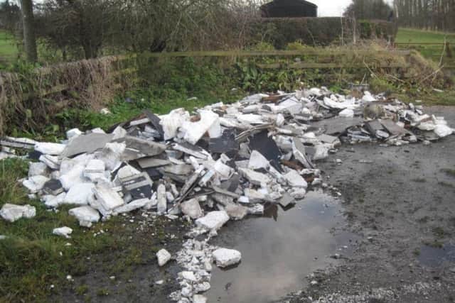 A separate example of the kind of fly-tipping often found by councils.