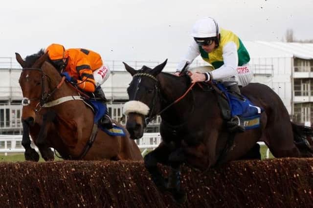 The ill-fated Many Clouds gets the better of Thistlecrack at Cheltenham on Saturday. (PHOTO BY: Julian Herbert PA Wire/PA Images)