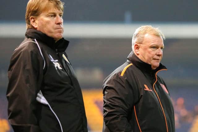 Mansfield Town's Assistant Manager Paul raynot (left) with Manager Steve Evans - Photo by Chris Holloway
