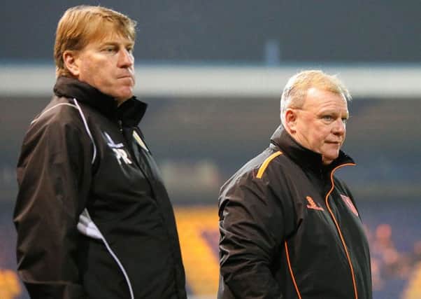 Mansfield Town's Assistant Manager Paul raynot (left) with Manager Steve Evans - Photo by Chris Holloway