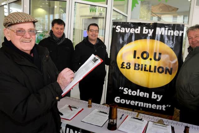 Donald Gibson adds his signiture to the Mineworkers Pension Fairplay petition, which has reached over 5000 names collected by Brian Glasper, Mick Newton and Charles Chiverton.