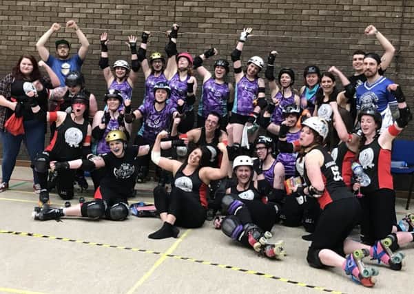 The victorious Mansfield Roller Derby squad.