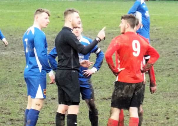 Yorkshire referee Ashley Royston issues a ticking-off in one of many flashpoints during Teversal's match at Pontefract Collieries. (PHOTO BY: Keith Parnill)