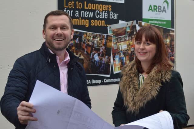 Richard Burns, of the ARBA Group, and Sarah Nelson, of Mansfield BID, outside the former bank building.