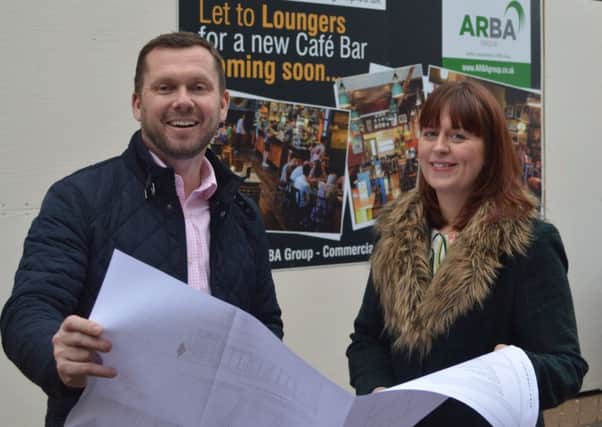 Richard Burns, of the ARBA Group, and Sarah Nelson, of Mansfield BID, outside the former bank building.