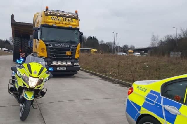 A quarry truck is on the move now under police escort J28 M1 to Pye Bridge via A38 & B600