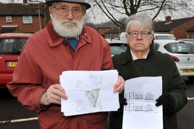 Residents on Eastfield Close, Clipstone are furious at plans to build new houses on their car park, pictured are angry residents Reg Taylor and Sandra Lowde