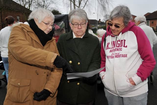 Residents on Eastfield Close, Clipstone are furious at plans to build new houses on their car park, Sandra Lowde discussing the plans with neighbours