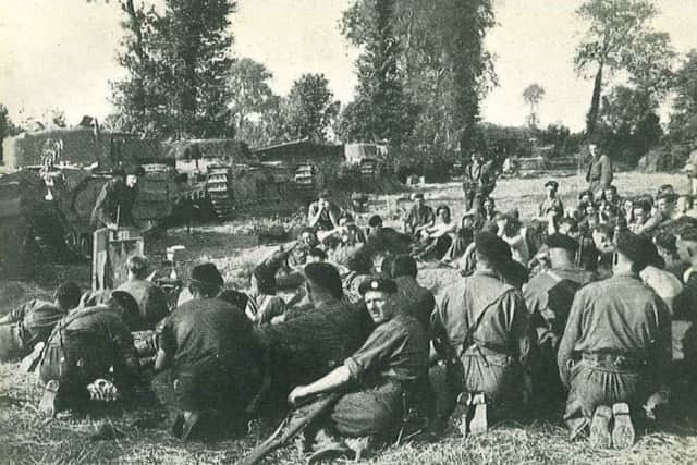 Major Tollemache briefs the troops near Estry
