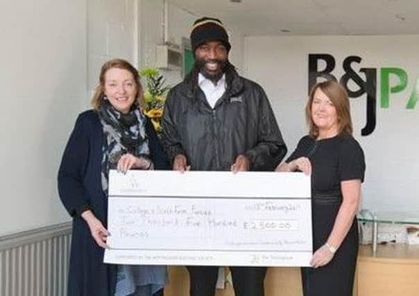 Mansfield Woodhouse businesswoman Bev Parr (right), with Nina Dauban, chief executive of the Nottinghamshire Community Foundation, and Dragons' Den competition winner, Duwayne Watson.