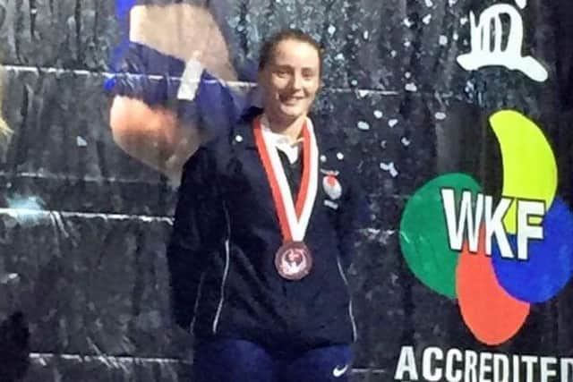 Bailey Lowe, a multiple champion in the sport of karate.