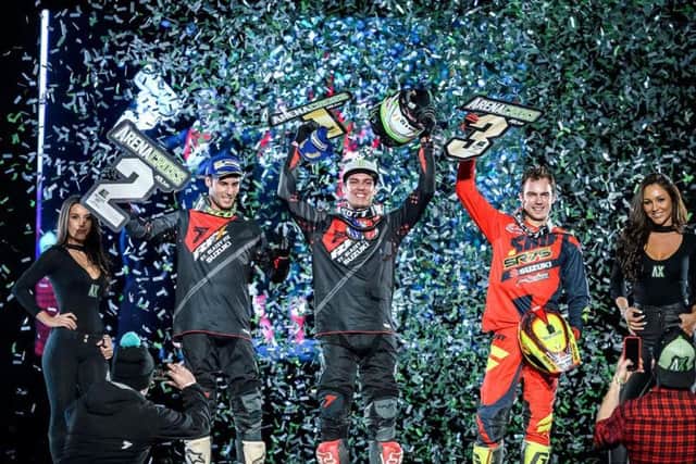 Arenacross UK 2017 Tour Sheffield Arena Pro winner Cedric Soubeyras, centre, celebrates with with second placed Angelo Pellegrini and third Thomas Ramette.