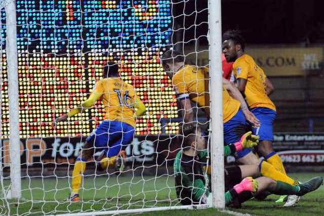 Mansfield v Accrington Stanley.
Hayden White turns away in celebration after scorint the Stags' second goal.