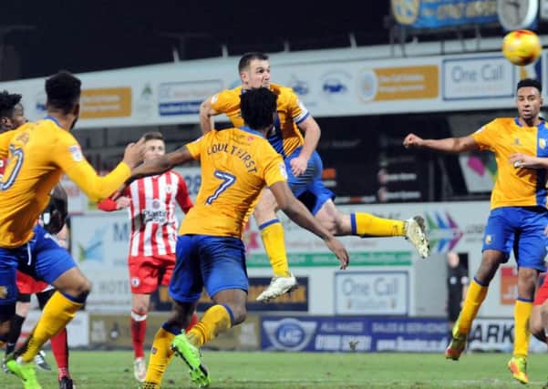Mansfield v Accrington Stanley.
Lee Collins gets in a shot in the second half.