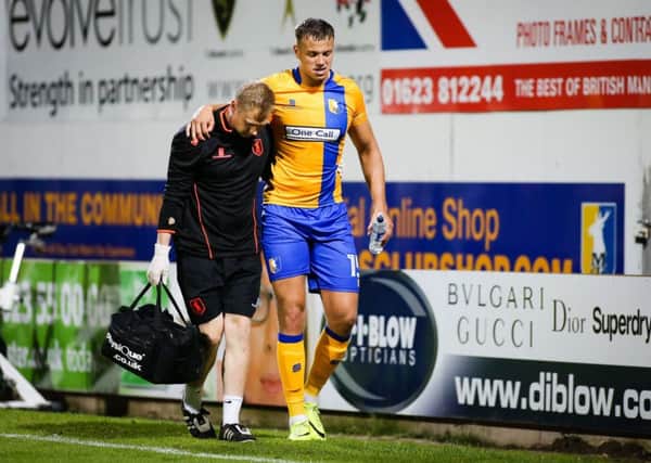 Mansfield Town's injured Kyle Howkins  - Pic Chris Holloway