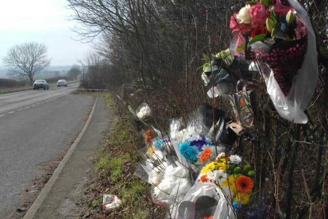 Tributes left to Lewis Crouch at the crash site near Mansfield Woodhouse.