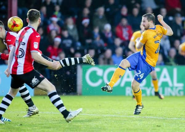 Mansfield Town's Jamie McGuire shoots - Pic Chris Holloway