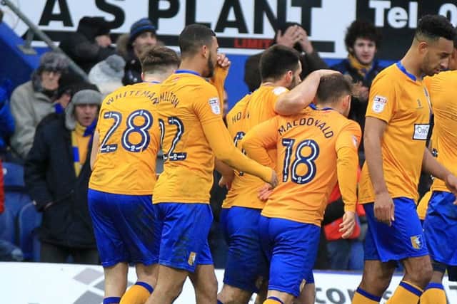 Mansfield Town v Newport County in the Sky Bet League 2. Mansfield player Shaquile Coulthirst scores Mansfield's 2nd goal. Picture: Chris Etchells