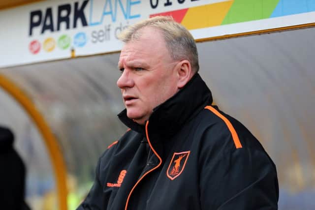 Steve Evans, who took his Mansfield Town squad down to Yeovil yesterday afternoon.