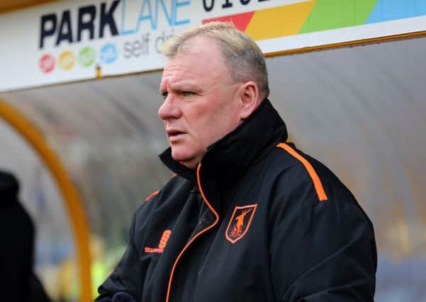 Steve Evans, who took his Mansfield Town squad down to Yeovil yesterday afternoon.