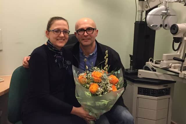Specsavers optometrist Claire Lomas with costomer Zeb Herbowski. Claire drove him to hospital in Chesterfield for emerency eye treatment.