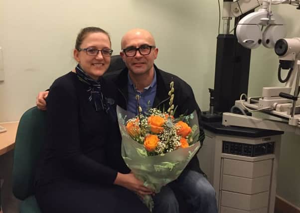 Specsavers optometrist Claire Lomas with costomer Zeb Herbowski. Claire drove him to hospital in Chesterfield for emerency eye treatment.