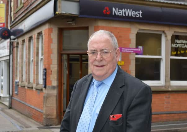 Eastwood Mayor Keith Longdon pictured outside NAT West Bank which is due to close