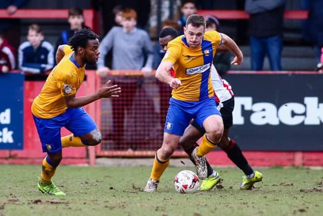 Mansfield Town's Lee Colins makes a break forward - Photo by Chris Holloway