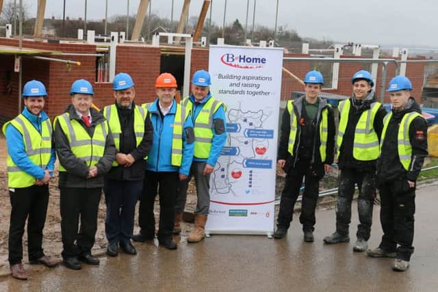 Matt Bust, business support manager, Woodhead, Coun John Ritchie, BDC, Peter Campbell, head of housing at BDC, Bob Chadwick Woodhead site manager, David Pearson Woodhead project manager, Josh Gozzard, Tyler Griffiths and Jake Rawson