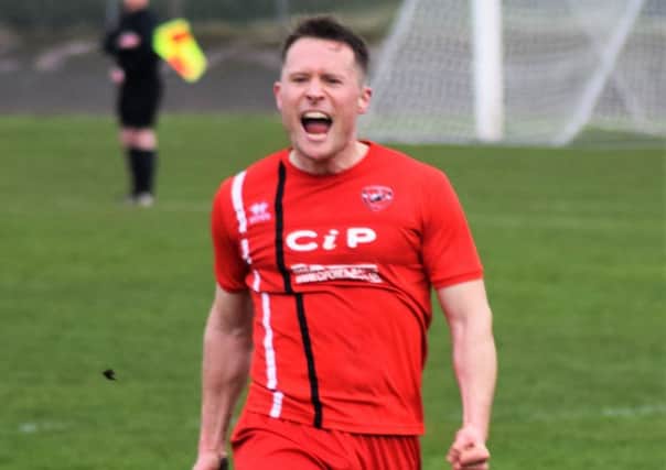 Callum Lloyd celebrates after scoring the only goal of the game for AFC Mansfield against Thackley.